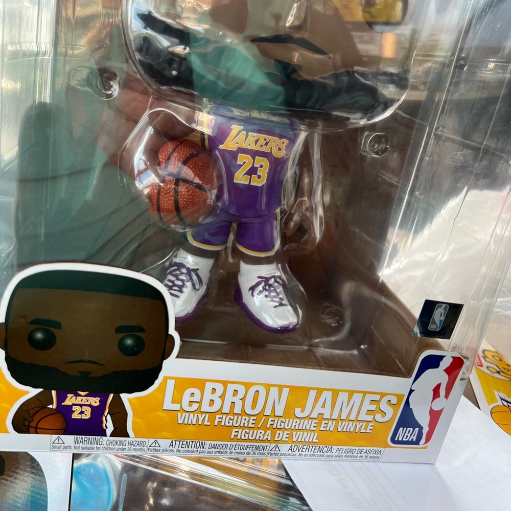 Awesome brand new 15” Lebrone James Funko Pop. Away uniform